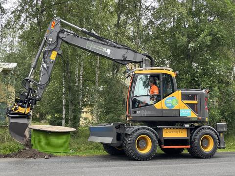 Lounean vihreä valokuitu kaivinkone Hemming